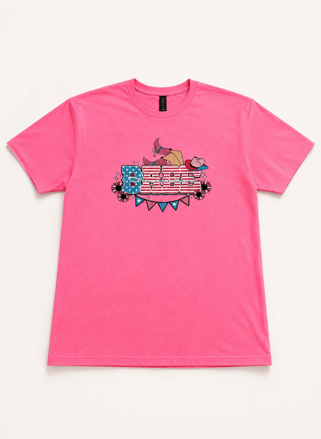 Pink t-shirt with graphic design on a white background
